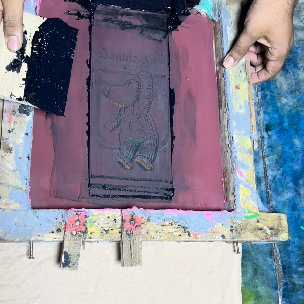 Screen-printing setup shown by Bandzlandia manufacturing